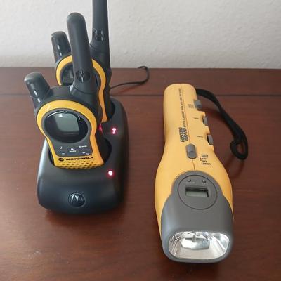 Motorola walkie talkies with charging station and an Electro Barand Multi use flashlight / radio