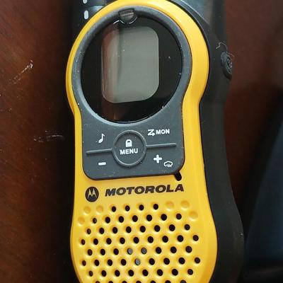 Motorola walkie talkies with charging station and an Electro Barand Multi use flashlight / radio