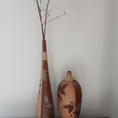 Two tall ceramic decorative vases