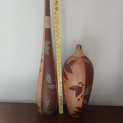Two tall ceramic decorative vases