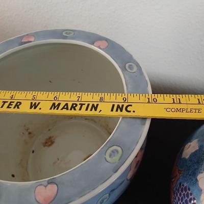 Ceramic flowerpot with decorative vase