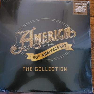 2 Brand new and unopened albums