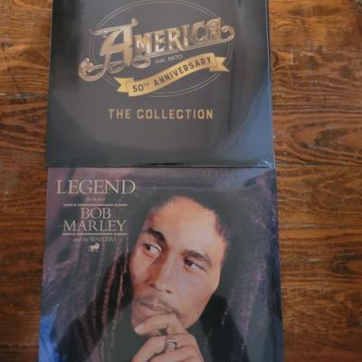 Sale Photo Thumbnail #944: Both still sealed Legend The Best Of Bob Marley and America The Collecion