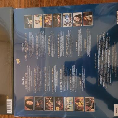 2 Brand new and unopened albums