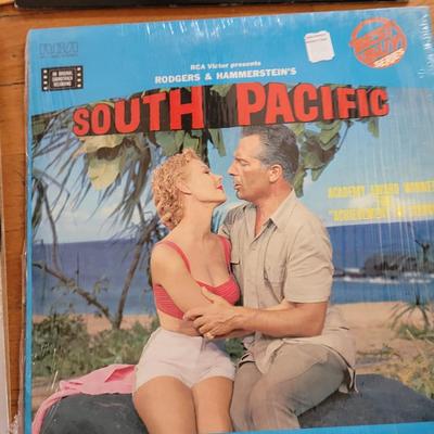6 movie soundtracks or showtune albums