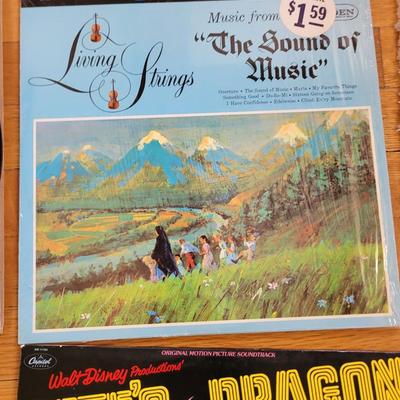 6 movie soundtracks or showtune albums