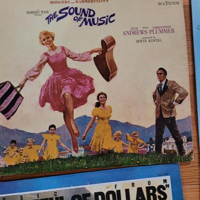 6 movie soundtracks or showtune albums