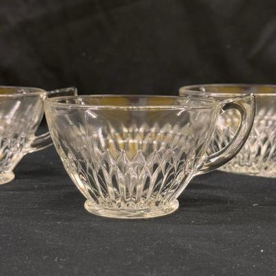 Several Glass Tea Cups and Small Plates (1050-DZ)