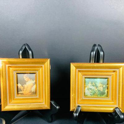 LOT:44: Vintage French Ornate Brass Framed Porcelain Cameos by Fragonard, Miniature Wall Art Porcelain Ashtrays and Mini Plates