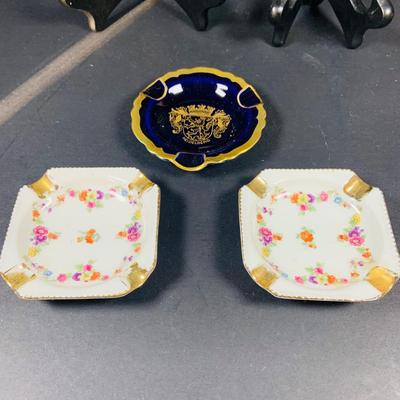 LOT:44: Vintage French Ornate Brass Framed Porcelain Cameos by Fragonard, Miniature Wall Art Porcelain Ashtrays and Mini Plates