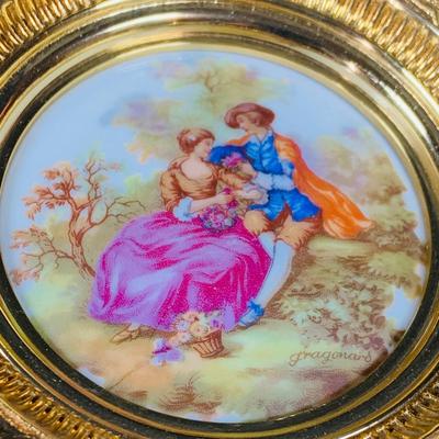 LOT:44: Vintage French Ornate Brass Framed Porcelain Cameos by Fragonard, Miniature Wall Art Porcelain Ashtrays and Mini Plates