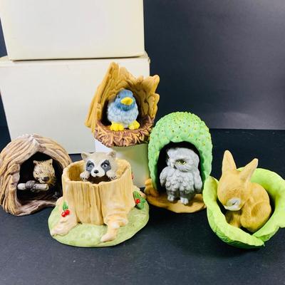 LOT:49: Franklin Mint Woodland Surprise Collection of Porcelain Figures - Beaver, Owl, Rabbit, Raccoon and Bluebird