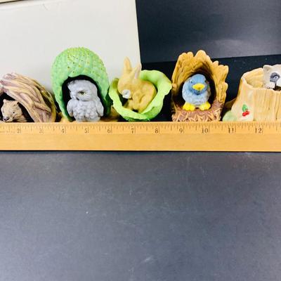 LOT:49: Franklin Mint Woodland Surprise Collection of Porcelain Figures - Beaver, Owl, Rabbit, Raccoon and Bluebird