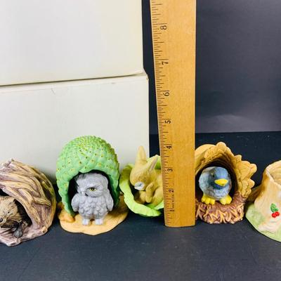 LOT:49: Franklin Mint Woodland Surprise Collection of Porcelain Figures - Beaver, Owl, Rabbit, Raccoon and Bluebird