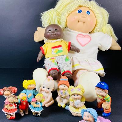 LOT:51: Cabbage Patch and More - 1982 Coleco Cabbage Patch Doll, (4) Cabbage Patch Kids Ceramic Figures, (4) Cabbage Patch Kids Plastic...