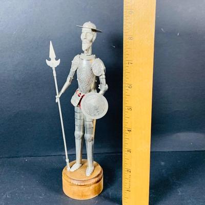 LOT:53: Medieval Coat of Arms, Don Quixote Metal Statue and Metal Ashtray, Miniature Alter Cross, Mini Brass Mortar and Pestle and a Thimble