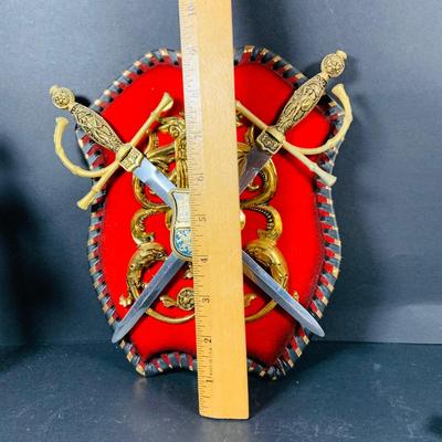 LOT:53: Medieval Coat of Arms, Don Quixote Metal Statue and Metal Ashtray, Miniature Alter Cross, Mini Brass Mortar and Pestle and a Thimble