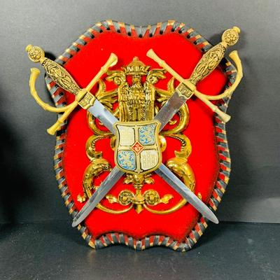 LOT:53: Medieval Coat of Arms, Don Quixote Metal Statue and Metal Ashtray, Miniature Alter Cross, Mini Brass Mortar and Pestle and a Thimble