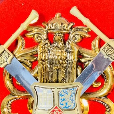 LOT:53: Medieval Coat of Arms, Don Quixote Metal Statue and Metal Ashtray, Miniature Alter Cross, Mini Brass Mortar and Pestle and a Thimble