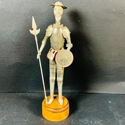 LOT:53: Medieval Coat of Arms, Don Quixote Metal Statue and Metal Ashtray, Miniature Alter Cross, Mini Brass Mortar and Pestle and a Thimble