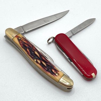 LOT 57: Olive Drab Right Angle Flashlight, Swiss Army Pen Knife, Winchester Folding Knife, Light Marker and More