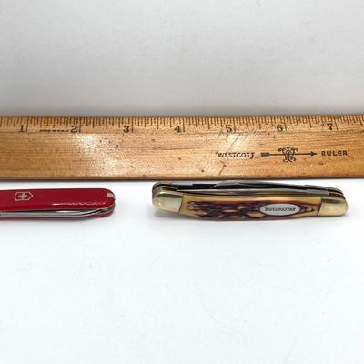 LOT 57: Olive Drab Right Angle Flashlight, Swiss Army Pen Knife, Winchester Folding Knife, Light Marker and More