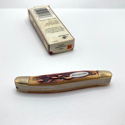 LOT 57: Olive Drab Right Angle Flashlight, Swiss Army Pen Knife, Winchester Folding Knife, Light Marker and More