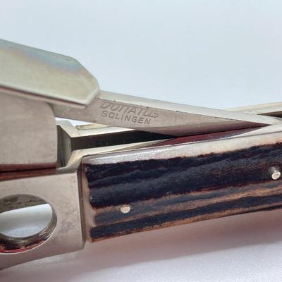 LOT 65: Vintage Solingen German Horn Handle Cigar Cutter, Eddie Bauer Classic Maple Yo-Yo / Shoe Horn, Sharp Folding Pocket Knife and More