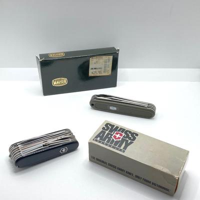 LOT 66: Pair of Army Knives in Original Boxes - Swiss Brand and Mauser