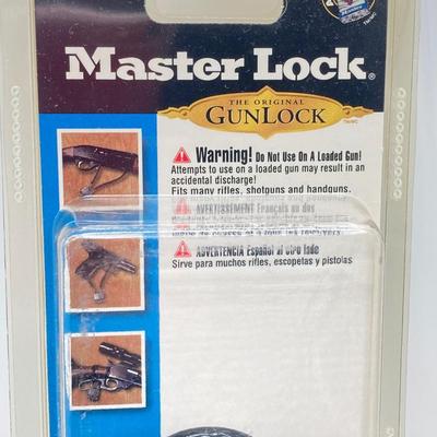 LOT 67: Smith & Wesson Homeland Security CKSUR5 Tanto Knife with Sheath in Original Box and Pair of Master Lock Gun Locks