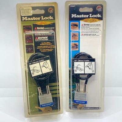 LOT 67: Smith & Wesson Homeland Security CKSUR5 Tanto Knife with Sheath in Original Box and Pair of Master Lock Gun Locks