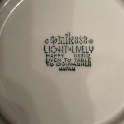 LOT 98: Mikasa Light n Lively "Happy" Dinnerware Set