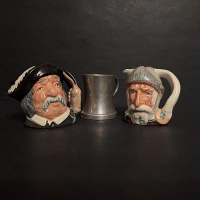 LOT 99: Royal Daulton Miniature Tobey Pitchers, Embossed Lightweight Brass Pitcher, England & Pewter Mugs