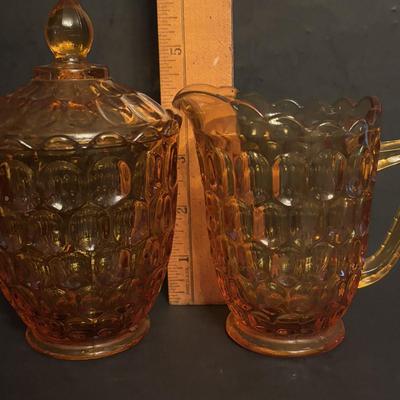 LOT 164: Collection of Vintage Amber & Marigold Glass: Footed Candy Dish, Thumb Print Sugar and Creamer Set Floral Candy Dishes