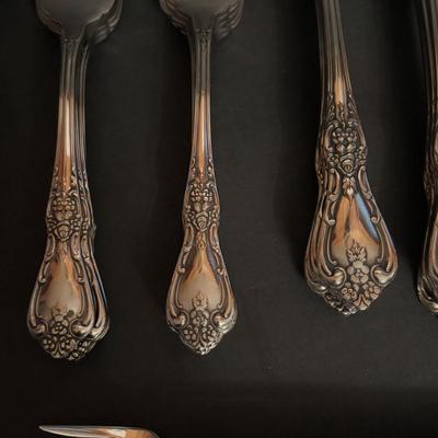 LOT 172: Distinction Deluxe Stainless by Oneida, 7 pc Place Setting, Service for 12 & 5 Serving Pieces