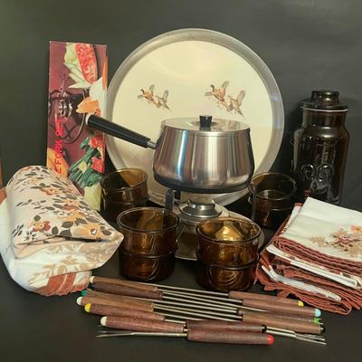 LOT 174: MCM Style Stainless Steel Fondue Set with 60 Inch Round Tablecloth and Matching Napkins (16 Inch Square) and More ...