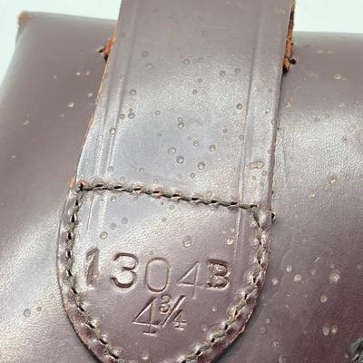 LOT 175: Pair of Leather Firearm Holders / Holsters - US and Red Head Brands