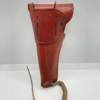LOT 175: Pair of Leather Firearm Holders / Holsters - US and Red Head Brands