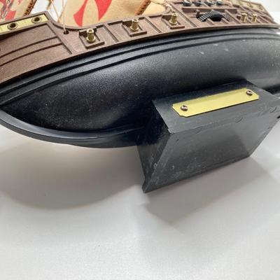 LOT 177: Explorer’s Collection - Santa Maria Ship Radio, Cork Art, Ship in Glass Bottle, Brass Whale, Decorative Desk Globe and More