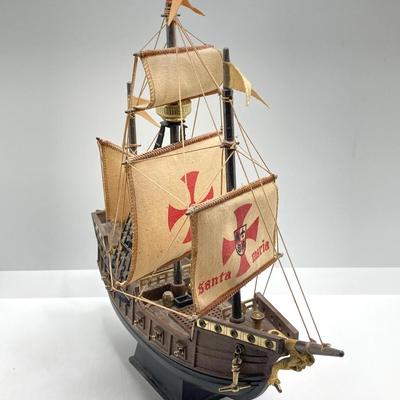 LOT 177: Explorer’s Collection - Santa Maria Ship Radio, Cork Art, Ship in Glass Bottle, Brass Whale, Decorative Desk Globe and More