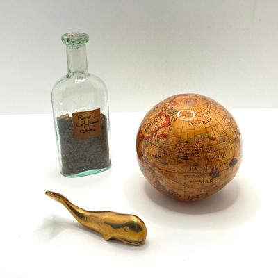 LOT 177: Explorer’s Collection - Santa Maria Ship Radio, Cork Art, Ship in Glass Bottle, Brass Whale, Decorative Desk Globe and More