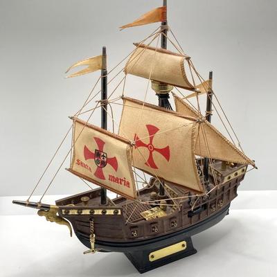 LOT 177: Explorer’s Collection - Santa Maria Ship Radio, Cork Art, Ship in Glass Bottle, Brass Whale, Decorative Desk Globe and More