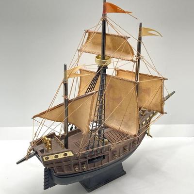 LOT 177: Explorer’s Collection - Santa Maria Ship Radio, Cork Art, Ship in Glass Bottle, Brass Whale, Decorative Desk Globe and More