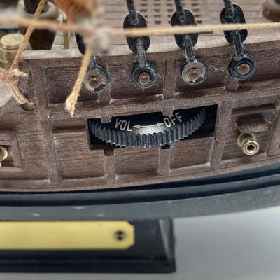 LOT 177: Explorer’s Collection - Santa Maria Ship Radio, Cork Art, Ship in Glass Bottle, Brass Whale, Decorative Desk Globe and More