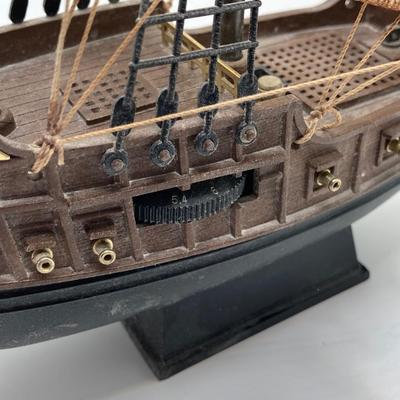 LOT 177: Explorer’s Collection - Santa Maria Ship Radio, Cork Art, Ship in Glass Bottle, Brass Whale, Decorative Desk Globe and More