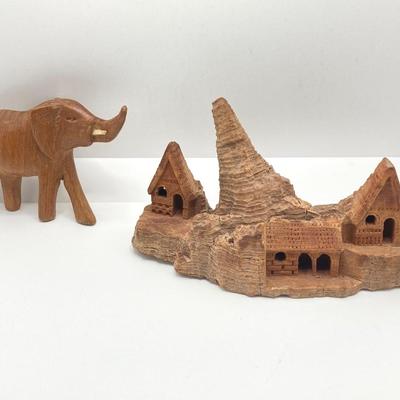 LOT 179: Hand Crafted Collection - The Metropolitan Museum of Art Prehistoric Bison Art, Fish Fossil, Percussion Frog, Carved Wood Decor...