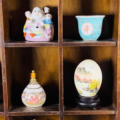 LOT:191: Wooden Display Case w/Asian Inspired Miniature Vases & Bottles and Painted Egg Shells and More