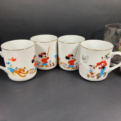 LOT:192: Large Assortment of Disney Collectables Including Glasses, Mugs, Ornaments, Toys and More