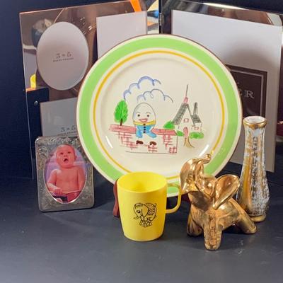 LOT:197: Stangl Humpty Dumpty Children's Plate, Stangle Gold-tone Elephant and Bud-vase, Silverplated Picture Frames and More