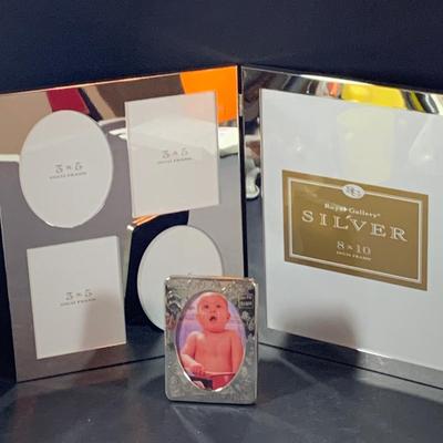 LOT:197: Stangl Humpty Dumpty Children's Plate, Stangle Gold-tone Elephant and Bud-vase, Silverplated Picture Frames and More